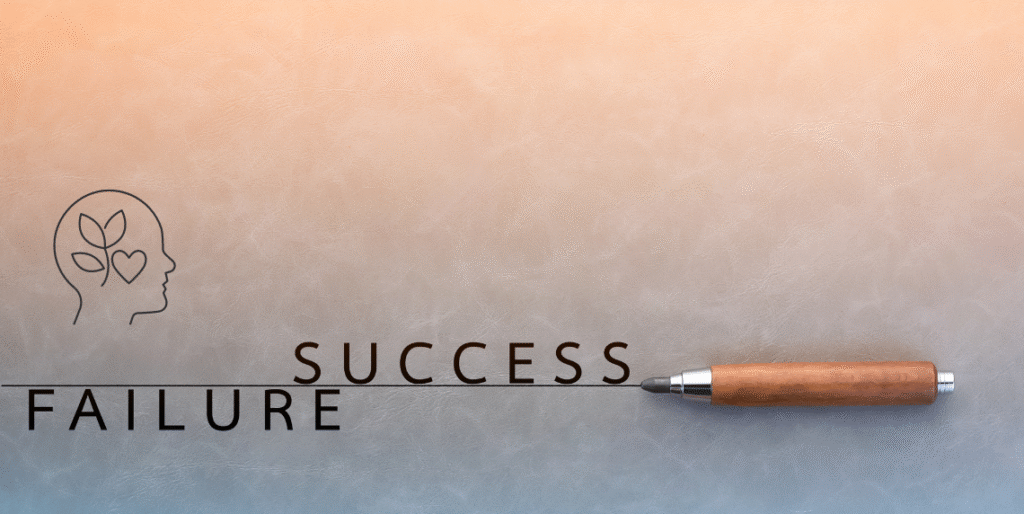 Pen crossing out failure and writing success with a growth mindset icon above