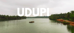 Serene Malpe Beach backwaters in Udupi, Karnataka with calm turquoise waters and coastal landscape